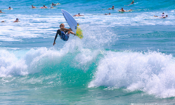 A young gromet carving up the waves, Coolangatta, QLD