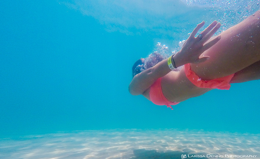 Chasing fish under the water, Whitehaven Beach, QLD