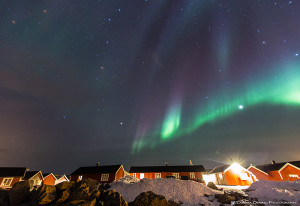 The northern lights dancing in the sky above my fishermans cabin at Eliassen Robruer, Hamnoy, Norway