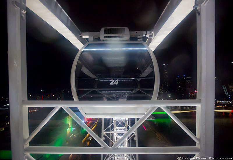View of Jordan and Ben in the capsule behind Scott and I on the Brisbane Wheel