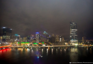 Night time view of a wet Brisbane City from high up on the Brisbane Wheel