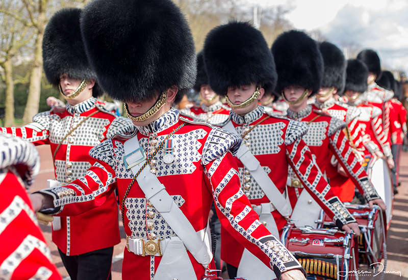 Guards marching to Buckingham Palace, London