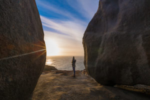 Standing between massive boulders, Kangaroo Island