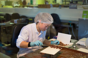 Meticulously crafting the perfect chocolate covered almond, Haighs Chocolate Factory