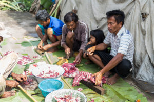 Way of life in the village as a family cuts up a goat and uses every piece, Desa Bahasa, Yogyakarta, Indonesia
