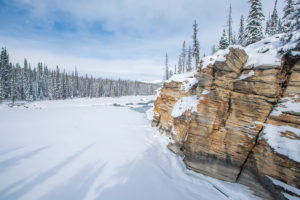 Frozen river at the bottom of Athabasca Falls. Jasper National Park, Alberta